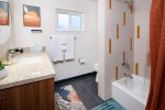 Completely remodeled, full bath with shower and tub.